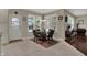 Bright dining area with multiple windows and a view of the outdoors at 11599 Braemar Ct, Carmel, IN 46032