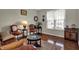 Inviting sitting room with a cozy ambiance and ample natural light at 11599 Braemar Ct, Carmel, IN 46032