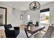 Bright home office with stylish lighting, a modern desk, and comfortable seating at 11836 Vale St, Indianapolis, IN 46235