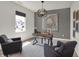 Bright and airy home office with modern decor, a sleek desk, and comfortable seating at 11836 Vale St, Indianapolis, IN 46235