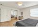 Spacious bedroom with plush carpet, natural light, and a mirrored closet door at 1280 Casco Bay Cir, Cicero, IN 46034