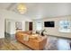 Cozy living room featuring hardwood floors, natural light, and stylish furnishings at 1280 Casco Bay Cir, Cicero, IN 46034