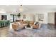 Bright living room with modern decor, sleek flooring, and comfortable seating arrangements at 1280 Casco Bay Cir, Cicero, IN 46034