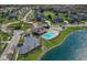 Gorgeous aerial view of the neighborhood pool, amenity center and surrounding homes and landscape at 13316 E Lieder Way, Fishers, IN 46037