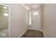 Entryway featuring hardwood flooring, white trim, and modern entry door at 13316 E Lieder Way, Fishers, IN 46037