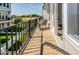 A cozy outdoor patio space with chairs and a railing offers neighborhood views at 13316 E Lieder Way, Fishers, IN 46037