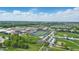 An aerial view shows a local high school with sports facilities, including a football field and baseball fields at 13510 E 131St St, Fishers, IN 46037