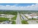 Aerial shot featuring a well-planned community with an expansive road leading to a main shopping center at 13510 E 131St St, Fishers, IN 46037