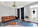 Inviting living room with hardwood floors, area rug, and natural light at 13510 E 131St St, Fishers, IN 46037