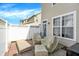 Cozy outdoor patio featuring comfortable seating for relaxation and entertaining guests at 13510 E 131St St, Fishers, IN 46037