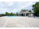 Large community pool with ample deck space, shaded lounge area, and convenient access, perfect for summertime relaxation at 13510 E 131St St, Fishers, IN 46037