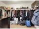 Well-organized walk-in closet with hanging rods, shelves, and plenty of storage space at 13510 E 131St St, Fishers, IN 46037