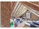 Unfinished attic space showcasing exposed beams and insulation, offering potential for customization at 1417 Macintosh Ct, Avon, IN 46123