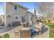 Charming backyard with a patio, outdoor seating, and a grill perfect for outdoor dining and relaxation at 1417 Macintosh Ct, Avon, IN 46123