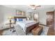 The bedroom features a wooden bed frame and matching side tables, complemented by a stylish rug at 1417 Macintosh Ct, Avon, IN 46123