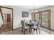 Dining room features tile floors and a view of the patio at 1417 Macintosh Ct, Avon, IN 46123