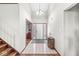 Bright foyer with tile flooring and a charming entryway table at 1417 Macintosh Ct, Avon, IN 46123
