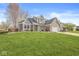 Charming two-story home with brick accents and a well-manicured lawn at 1417 Macintosh Ct, Avon, IN 46123