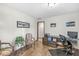 Cozy home office with hardwood floors, neutral walls, and a functional desk setup at 1417 Macintosh Ct, Avon, IN 46123