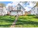 Charming two-story home with well-manicured lawn at 143 W Washington St, Mooresville, IN 46158