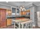 Well-equipped kitchen with custom cabinets, an island, stainless steel appliances, and modern finishes at 143 W Washington St, Mooresville, IN 46158