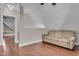 Comfortable sitting room with wood floors, neutral colors, and bright lighting at 143 W Washington St, Mooresville, IN 46158