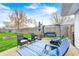 A beautiful backyard patio includes outdoor seating and furniture, plus a swing and fire pit at 1508 Douglas Dr, Franklin, IN 46131