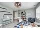 Comfortable living room with neutral walls, modern lighting, stylish furniture, and attractive decor at 1508 Douglas Dr, Franklin, IN 46131