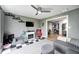 Comfortable living room with a ceiling fan, electric fireplace, and gray sectional sofa at 1508 Douglas Dr, Franklin, IN 46131
