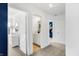 Upstairs hallway leads to the bathroom in this well-lit, modern home at 15379 Alperton Rd, Fishers, IN 46037