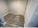 Functional entryway with durable floors, neutral paint, and convenient access at 1546 Kappes St, Indianapolis, IN 46221