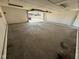Unfinished garage with concrete floor and unfinished ceiling at 1546 Kappes St, Indianapolis, IN 46221