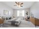 Beautiful bedroom with neutral colors, stylish furnishings, ceiling fan and lots of natural light at 1616 Capra Ct, Beech Grove, IN 46107