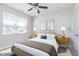 Cozy bedroom featuring soft lighting, neutral colors, and a comfortable bed with stylish side tables at 1616 Capra Ct, Beech Grove, IN 46107