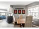 Charming dining area features a wooden table with seating for four and unique decor at 1720 Justin Ct, Indianapolis, IN 46219
