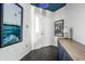 Bright entryway with modern light fixture, white walls, and elegant decor at 1720 Justin Ct, Indianapolis, IN 46219