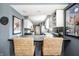 View of the kitchen with modern appliances, ample counter space, and stylish bar seating at 1720 Justin Ct, Indianapolis, IN 46219