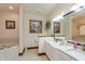 Bright bathroom with double sinks, granite countertops, and a soaking tub at 1853 Water Oak Ct, Avon, IN 46123