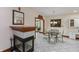 Cozy breakfast nook with fireplace, tile floors and dining table with seating for four at 1853 Water Oak Ct, Avon, IN 46123