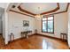 Bright living room featuring hardwood floors, custom trim, and large window for natural light at 1853 Water Oak Ct, Avon, IN 46123