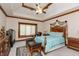 Spacious main bedroom with a decorative ceiling and a sitting area at 1853 Water Oak Ct, Avon, IN 46123
