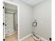 Utility room offering a laundry hookup and access to an adjacent bathroom with a stand-up shower at 1965 Churchill Rd, Franklin, IN 46131