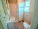 Functional bathroom with a shower, vanity, and neutral color scheme at 2109 N Janney Ave, Muncie, IN 47304
