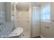 Bright bathroom with a shower and a vanity at 2109 N Janney Ave, Muncie, IN 47304