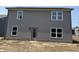 A view of the backyard of this two story home featuring vinyl siding at 24517 Wallace St, Sheridan, IN 46069