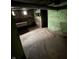 Unfinished basement with painted brick walls and concrete flooring, ready for customization at 2657 E Riverside Dr, Indianapolis, IN 46208