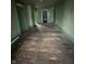 Spacious bedroom with wood floors and a built-in closet at 2657 E Riverside Dr, Indianapolis, IN 46208