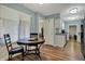 Inviting dining area features wood floors, a round table, and natural light at 2979 Amherst St, Indianapolis, IN 46268
