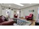 Inviting living room with hardwood floors, featuring access to other rooms and a comfortable seating area at 2979 Amherst St, Indianapolis, IN 46268