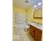Clean bathroom with a tub/shower combo and ample storage at 301 Barton Ave, Indianapolis, IN 46241